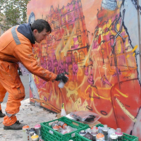 Elph live painting his riot mural in the Grassmarket.